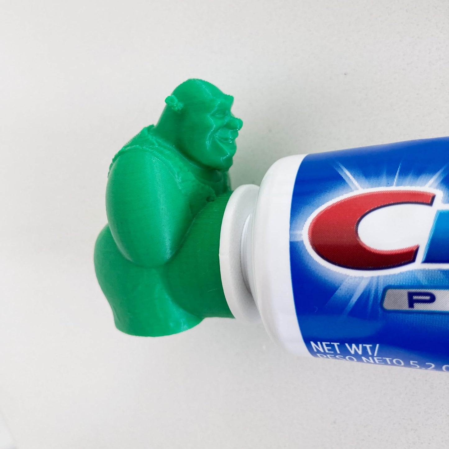 PRODUCTO 664 TUBECAPZ Divertido adorno para pasta de dientes Shrek, incluye 2 adaptadores para tubos Crest y Colgate (Shrek)